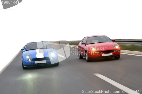 Image of Isolated tuning cars racing on highway 