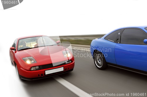 Image of Isolated tuning cars racing on highway 