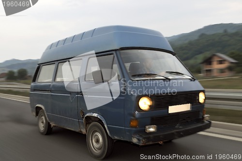 Image of Tuning cars sacing down the highway