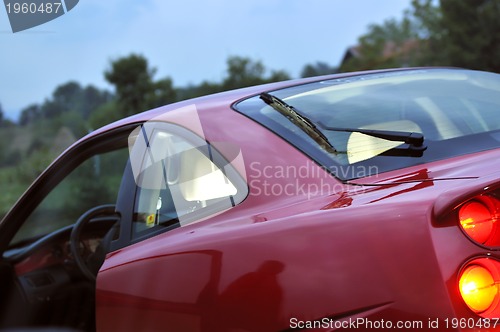 Image of Tuning cars sacing down the highway