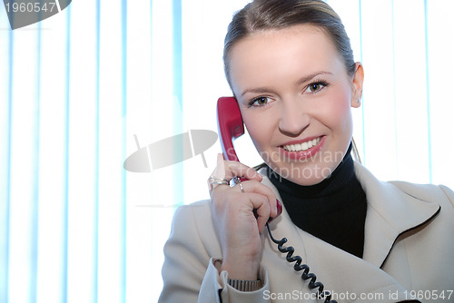 Image of .businesswoman talking by phone
