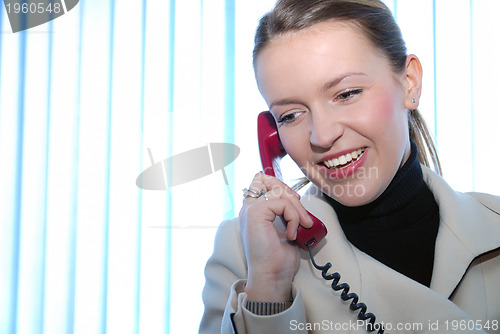 Image of .businesswoman talking by phone