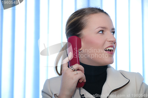 Image of .businesswoman talking by phone