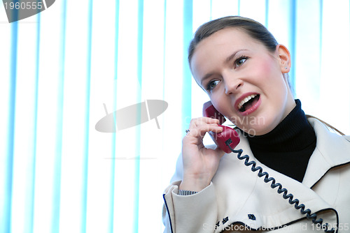 Image of .businesswoman talking by phone