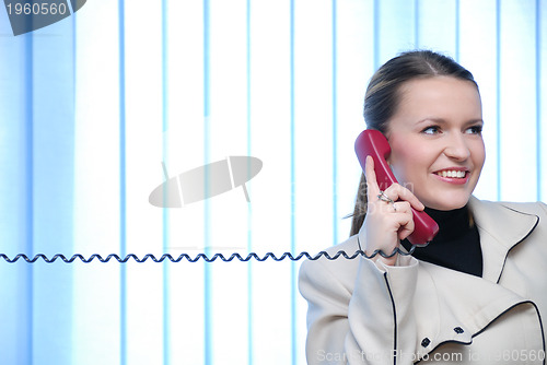 Image of .businesswoman talking by phone