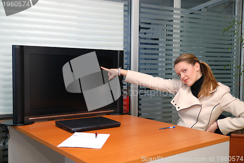 Image of business woman pointing on screen