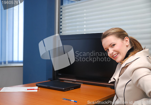 Image of business woman pointing on screen