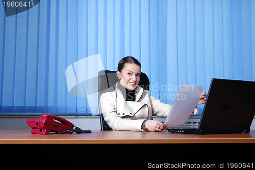 Image of .businesswoman readin document