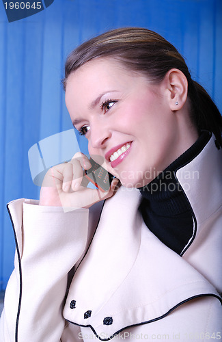 Image of Businesswoman Talking by Cellphone
