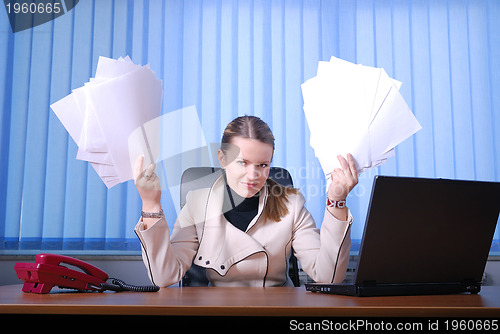 Image of .businesswoman holding empty documents