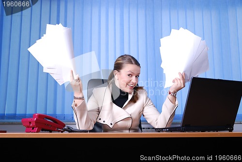 Image of .businesswoman holding empty documents