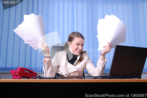 Image of .businesswoman holding empty documents