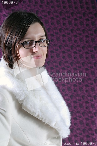 Image of portrait of a beautiful brunett  wearing winter coat