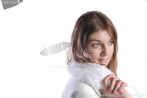 Image of Isolated portrait of beautiful woman in a winter coat