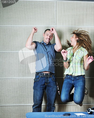 Image of happy young couple indoor
