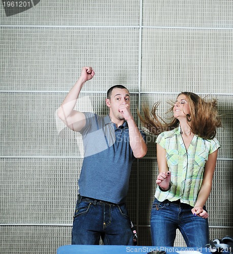 Image of happy young couple indoor