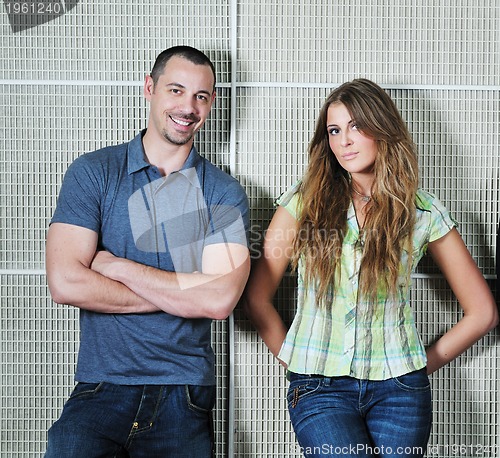 Image of happy young couple indoor