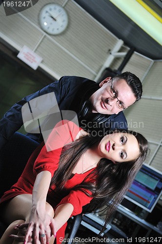 Image of happy young couple indoor