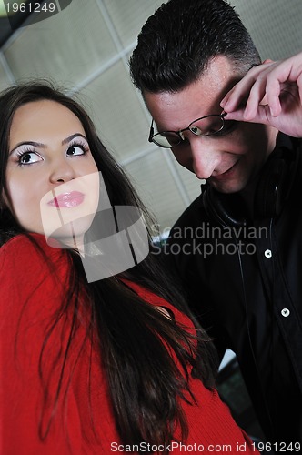 Image of happy young couple indoor