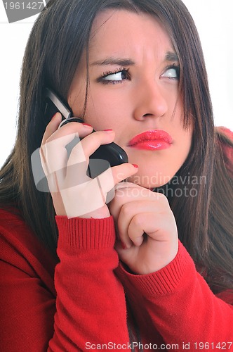 Image of woman in red talking on cellphone