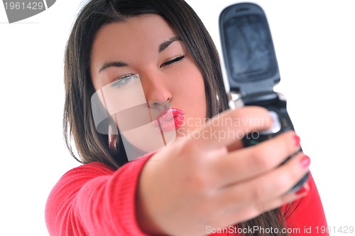 Image of woman in red talking on cellphone