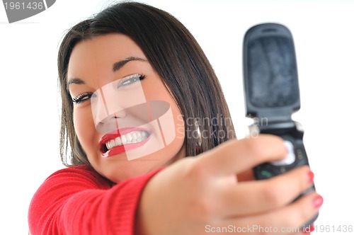 Image of woman in red talking on cellphone
