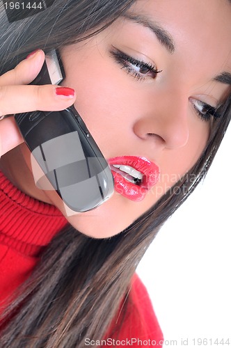 Image of woman in red talking on cellphone