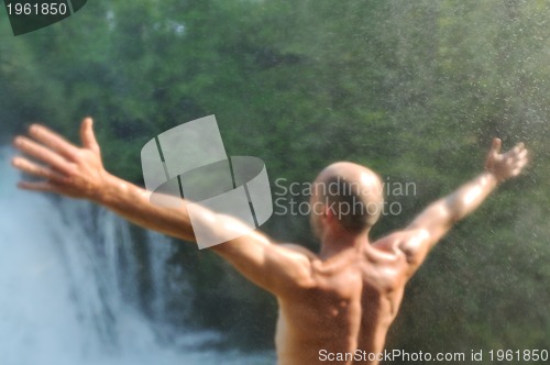 Image of man waterfall