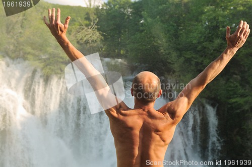 Image of man waterfall