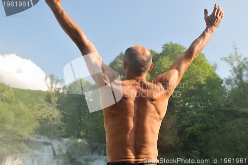 Image of man waterfall