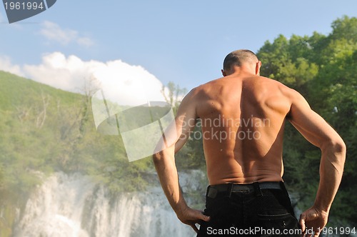 Image of man waterfall