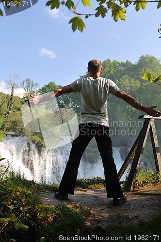 Image of man waterfall