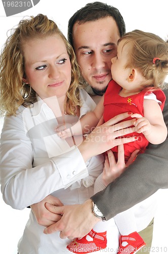 Image of happy young family together in studio