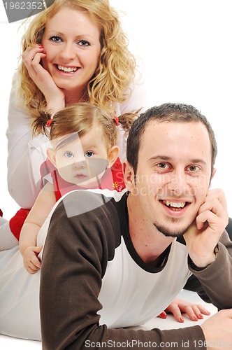 Image of happy young family together in studio
