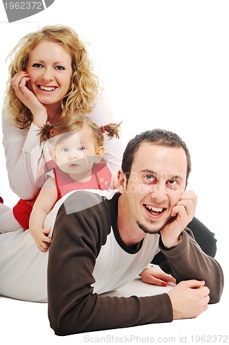 Image of happy young family together in studio