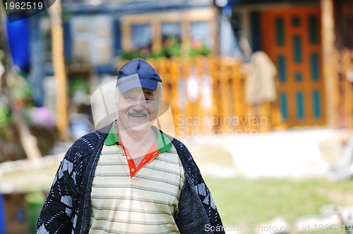 Image of happy senior man outdoor