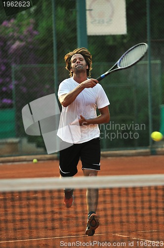 Image of tennis man