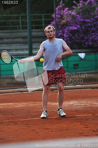Image of tennis man