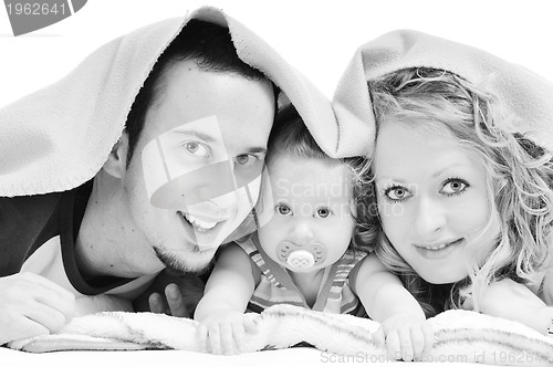 Image of happy young family together in studio