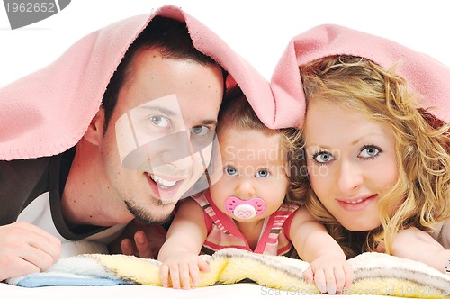 Image of happy young family together in studio