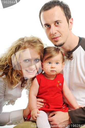 Image of happy young family together in studio