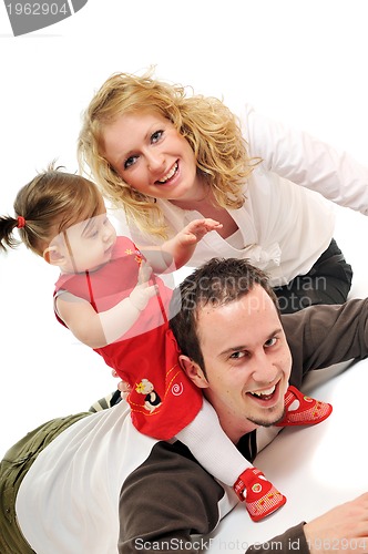 Image of happy young family together in studio
