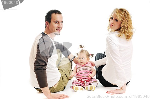 Image of happy young family together in studio