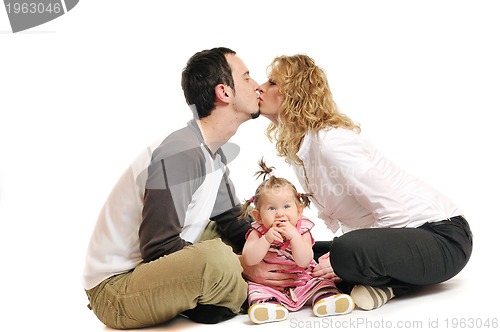 Image of happy young family together in studio