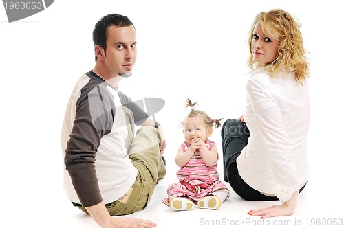 Image of happy young family together in studio