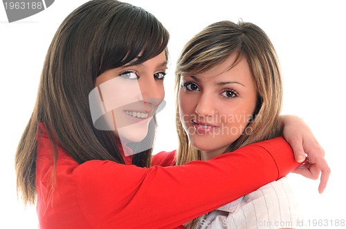 Image of two young girls isolated on white