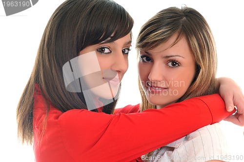 Image of two young girls isolated on white