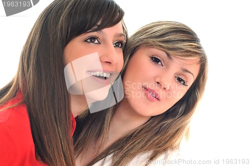 Image of two young girls isolated on white