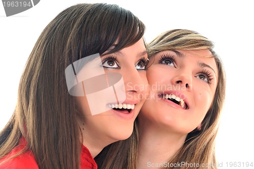 Image of two young girls isolated on white