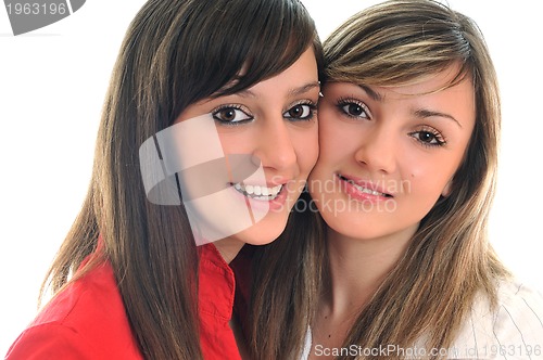 Image of two young girls isolated on white